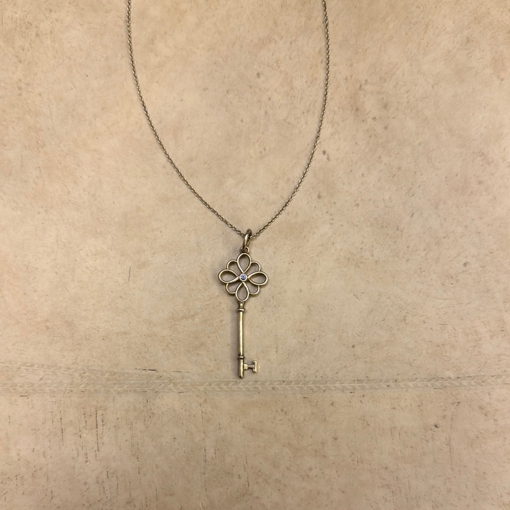 Tiffany & Co. Silver Key Necklace with blue sapphire